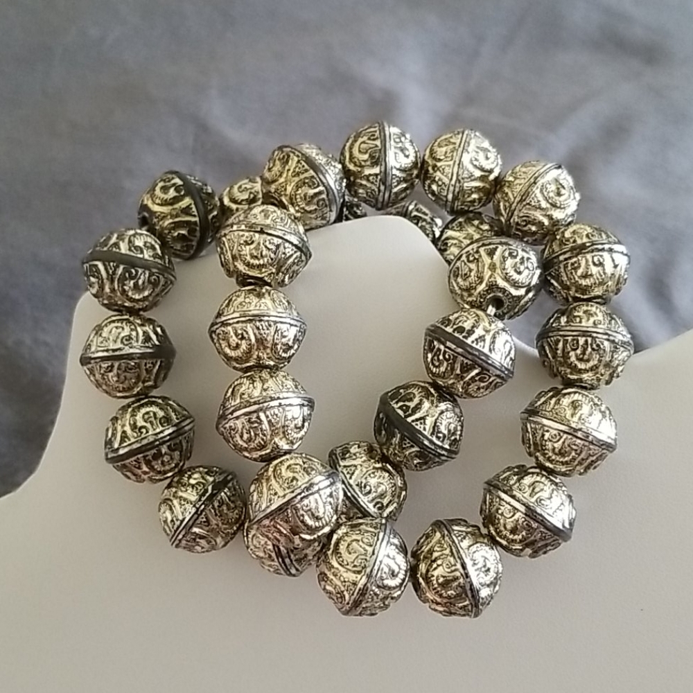 Two Silvertone Elastic Bead Bracelets